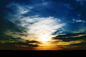 Sunset background. High contrast sunset. Simple skyscape evening. Cloudy dawn sky. Late dusk...