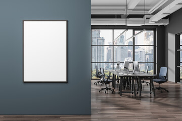 Gray and blue open space office with poster - obrazy, fototapety, plakaty