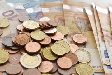 Euro banknotes and Euro coins on the table. Saving money for future. Money background. 