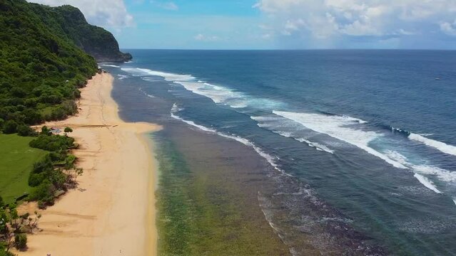 Aerial view of Nunggalan beach in Bali, Indonesia stock video. 