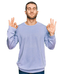 Young caucasian man wearing casual clothes relax and smiling with eyes closed doing meditation gesture with fingers. yoga concept.