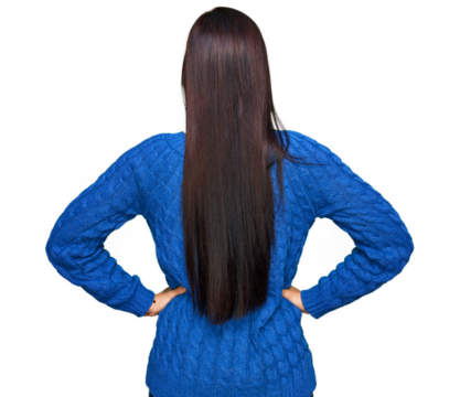 Young hispanic woman wearing casual clothes standing backwards looking away with arms on body