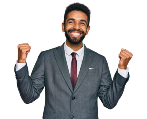 Young african american man wearing business clothes celebrating surprised and amazed for success with arms raised and open eyes. winner concept.