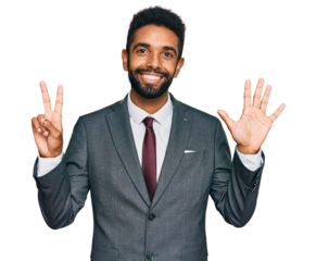 Young african american man wearing business clothes showing and pointing up with fingers number seven while smiling confident and happy.