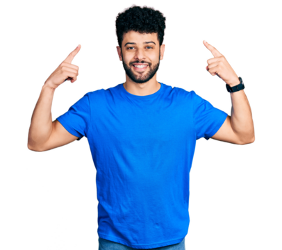 Young arab man with beard wearing casual blue t shirt smiling pointing to head with both hands finger, great idea or thought, good memory