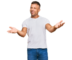 Handsome muscle man wearing casual white tshirt smiling cheerful offering hands giving assistance and acceptance.