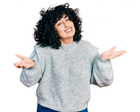 Young middle east girl wearing casual clothes clueless and confused expression with arms and hands raised. doubt concept.