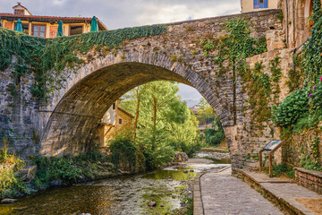 Potes bridge and Deva river in its path. In the Liebana region, Cantabria, Spain.