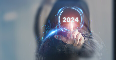 2024 annual business plan and digital business concept. Technology and innovation for business transformation. Goal achievement and success in 2024. Businessman pressing button on smart background. - obrazy, fototapety, plakaty