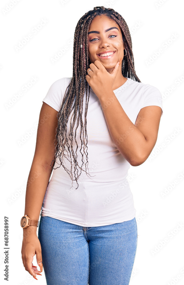 Sticker Young african american woman with braids wearing casual clothes looking confident at the camera smiling with crossed arms and hand raised on chin. thinking positive.