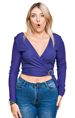 Fototapeta premium Young caucasian woman wearing casual clothes afraid and shocked with surprise expression, fear and excited face.
