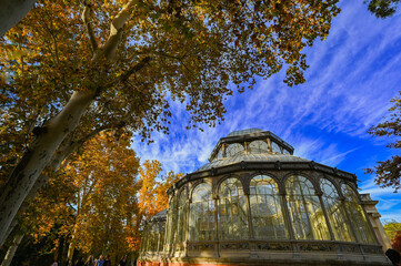 Fototapeta na wymiar Madrid, Spain - November 18, 2023, Panorama of Palacio de Cristal , Glass Palace, in Buen Retiro Park in Madrid, Spain. High quality photo