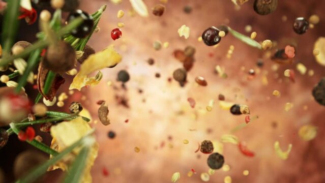 Super Slow Motion of Falling and Rotating Spices Mix. Filmed on High Speed Cinema Camera, 1000 fps.
