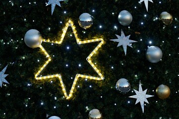 Fototapeta premium Christmas tree with decorations. Background for winter and Christmas holidays.