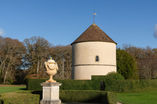 Choisel, France - November 28 2023: Dovecote in the Formal Garden in the Park of the Chateau de Breteuil. This castle is located in Choisel in the Chevreuse Valley near Paris.