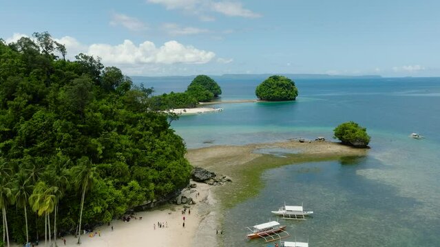 Sandy beach in Hiyor-Hiyoran Island. Britania Islands. Surigao del Sur, Philippines.