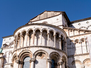 Exterior of the bottom of the nave (apse) of the historic church of Santa Maria Bianca in Lucca, Tuscany, Italy.