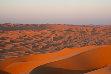 Fototapeta na wymiar Panorama of beautiful desert sand dunes, in Liwa, Rub'al Khali, united arab emirates