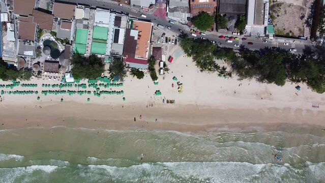 Aerial top down view of Thai Patong Beach and Bangla Road known for its nightlife lined with many bars cafes and discotheques prostitution in Thailand is illegal but tolerated 4k high resolution