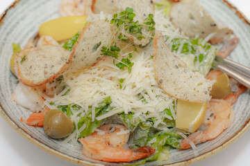 Delicious Vegetarian Plate with Fresh Produce and Kitchen Utensils. Fresh and nutritious vegetarian meal, prepared in a modern kitchen.