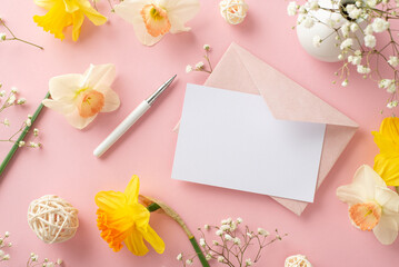 Writing a romantic letter on spring season concept. High-angle view picture of tender narcissus and...