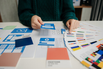 UX graphic designer planning application process development prototype wireframe for web smart phone.