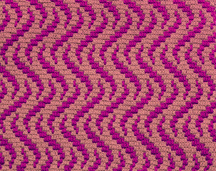 Purple lilac crochet abstract background. Mosaic crochet pattern.