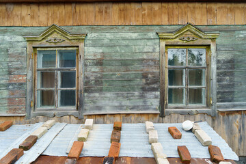 Old dilapidated wooden house.