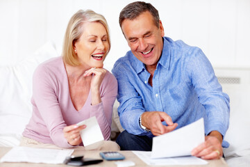 Home, finance and senior couple with paperwork, savings or mortgage debt with insurance checklist,...