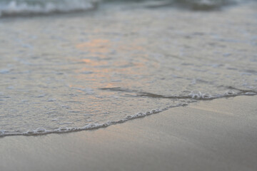 Soft Small wave of sea on a sandy beach, Soft focus