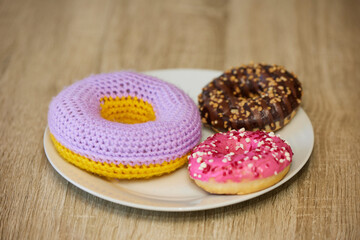 Cute toy near real on a plate