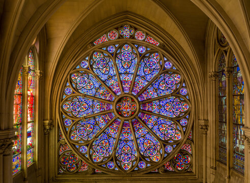  Intricate rose window with biblical imagery.