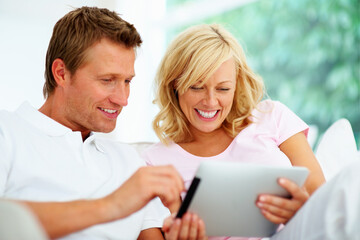 Couple, tablet and smile in home for social media, download ebook app and streaming internet show. Happy man, woman and scroll on digital technology, online shopping and search blog post in lounge