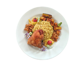 Indonesian fried rice with fried chicken on a white plate, flat lay, isolated