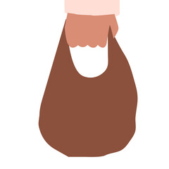Hand holding shopping bag.