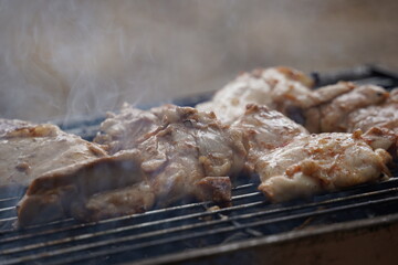 Fresh chicken steak grill meat on fire. Making barbecue on the grill