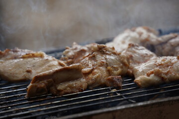 Fresh chicken steak grill meat on fire. Making barbecue on the grill