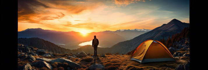 Solo Traveler with Tent in Mountainous Sunset Landscape