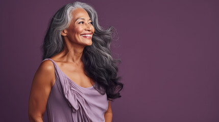 Polynesian woman, 60s, gray hair, purple studio setting