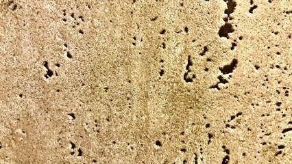 海水で腐食した粗いベージュ色のコンクリート