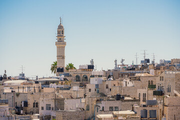 View of Bethlehem cityscape in the West Bank featuring the Minaret of the Mosque of Omar