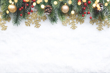 Obraz na płótnie Canvas Christmas fir tree with decoration on snow background, flat lay