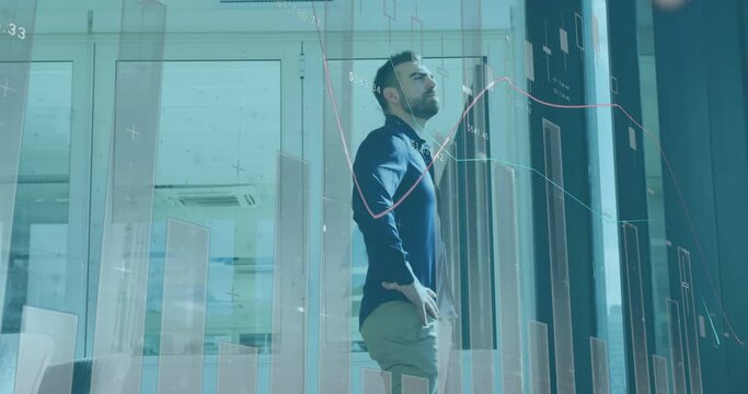 Animation of financial data processing over caucasian businessman in office