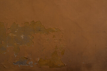 dark ocher plaster wall of old mediterranean city