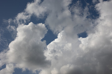 Blue sky. Beautiful Cumulus clouds flying across the sky, Beautiful natural clouds on the sky, deep blue sky