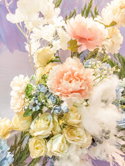 Colorful of artificial flowers on the wall for decorate in wedding ceremony