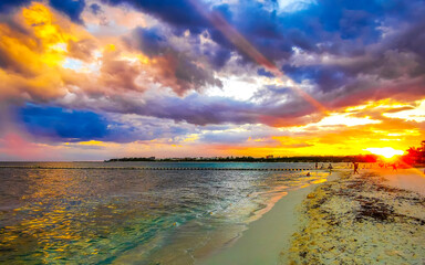 Fototapeta na wymiar Awesome sunset at tropical Caribbean beach Playa del Carmen Mexico.