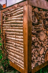 Large man made insect hotel in public gardens