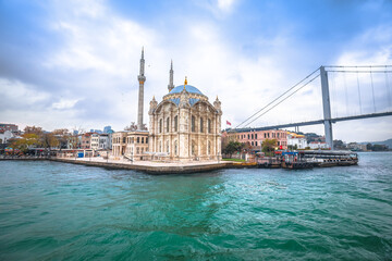 Fototapeta na wymiar Ortakoy Mosque or Buyuk Mecidiye Camii and Bosphorus bridge in Istanbul view