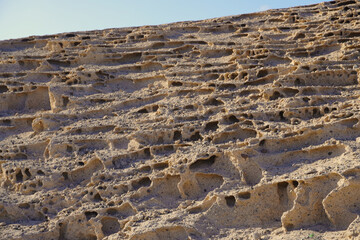 Tajao, South Tenerife, Canary Islands, Spain. Landscape resulting from wind erosion. In this area of ​​the island the intense wind sculpts taffonis, curious shapes and hollows in the rock